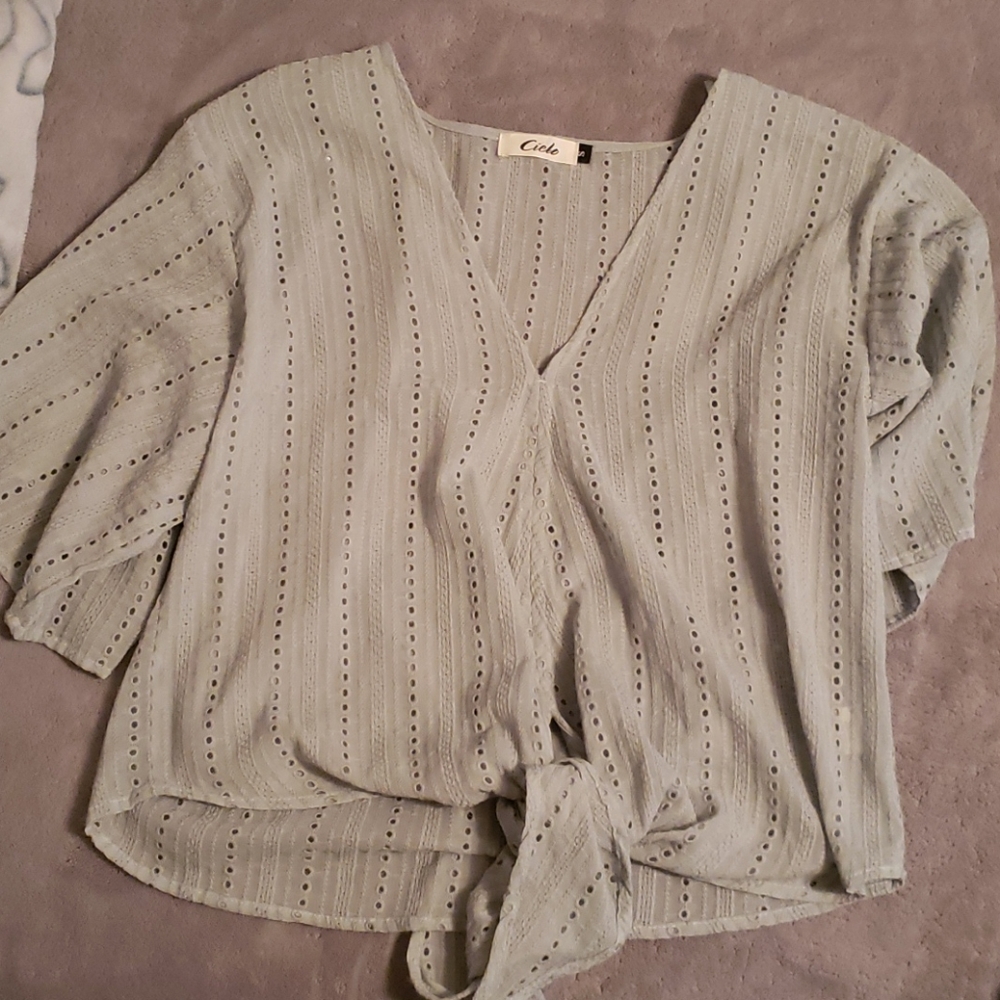 Blue blouse and tank top set.